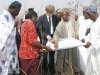 Asst. Dir. of Agriculture Mrs. Afanja reviewing survey