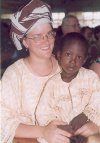 Miss Rhonda Van De Stroet, the Pioneer Resident Missionary holding one of the native kids in Fiditi